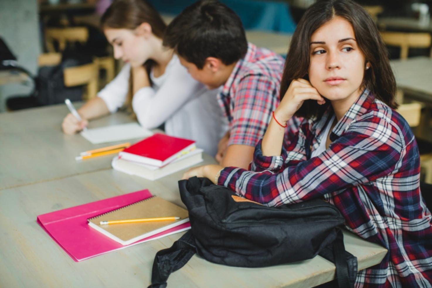 Students collaborating on financial planning exercises in a modern learning environment